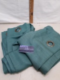 teal colored curtains, 2 pieces, 84 inches long, some snags