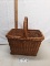 tall woven basket with handle