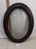 antique wood oval frame with bubble glass