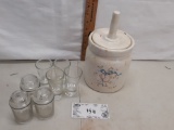 ceramic canister with tall handled lid, shot glasses, small glass jars