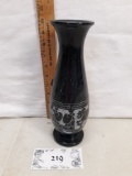 black marble vase with etched décor