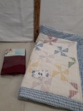 small baby quilt windmill pattern, two red Martha Stewart pillowcases