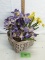 woven handled basket with silk floral display