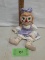 ceramic fabric doll look figurine with some cold painted features