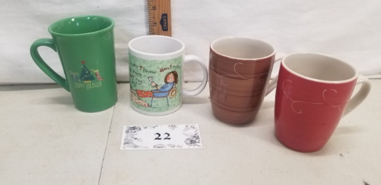 four ceramic coffee mugs