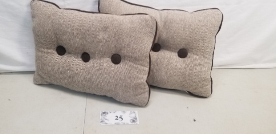two chevron brown pillows