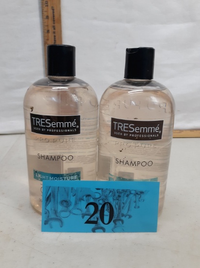 two bottles Tresemme pro pure light moisture shampoo