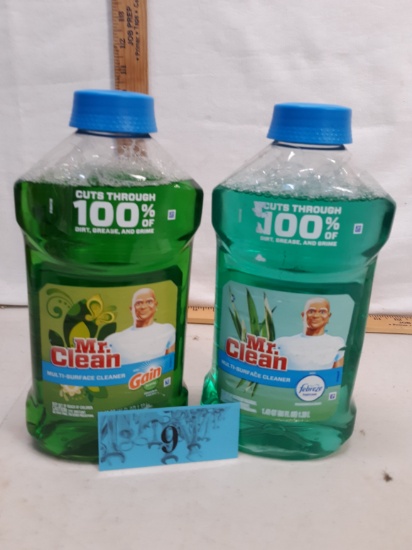 Two bottles Mr Clean multi surface cleaner, one with Gain, one with Fabreze