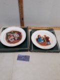 Two Avon Christmas wall plates
