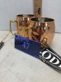 Two copper on tin ODI mule drinking mugs