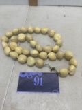 Vintage Kukui nut necklace, painted ivory