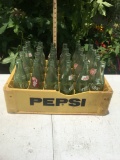 Old Plastic Yellow Crate with Bottles