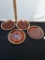 Four brown drip dinner plates