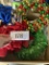 three wreaths, two christmas, one red white and blue