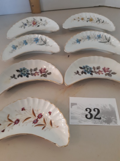 seven Victorian bone dishes, hand painted and transfer floral patterns