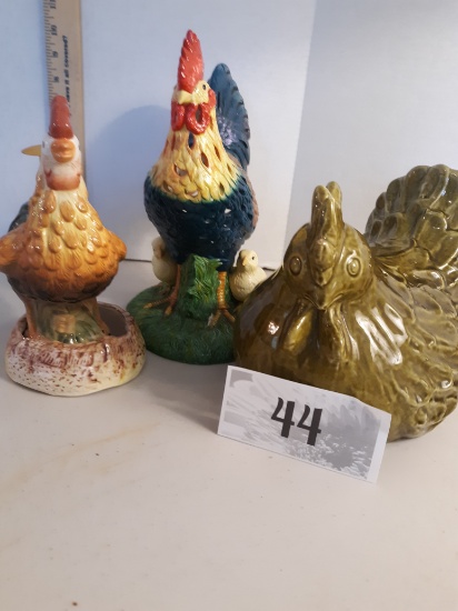 Three ceramic chickens, votive holder, soap dispenser, figurine