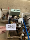 bins of various tools and small garage stuff, rope, saw, hand drills, etc