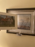 Two images, one framed mountain and sea, one matted barn