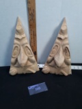 2 hard carved tree man faces