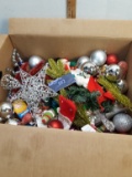 Box full of Christmas decorations