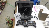xbox 360 system, comes with plug, and two controllers wireless tested