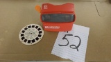 view master, vintage in red with a slide disc of mickey mouse