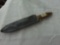 large knife, wood and brass handle with leather cover 9in blade