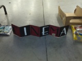 metal cinema sign, free standing or has a wire for hanging 21in long and 5in tall