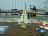 sailboat, wood boat on stand with sail 13.5in tall and 7.5in long