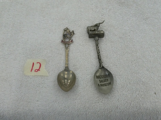 collector spoons, one from texas made in england and one from canada made in canada