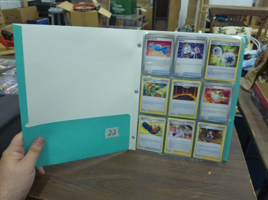pokemon cards, folder full of cards