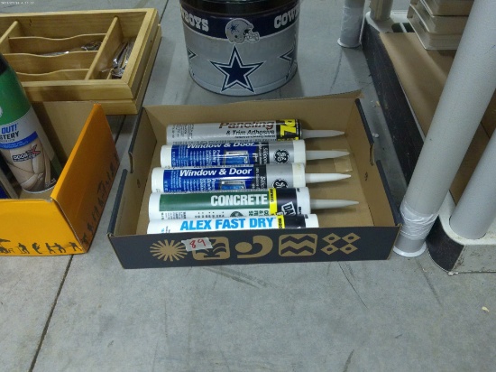 caulking, 3 new tubes also includes a new tube of concrete and a tube of paneling adhesive