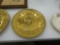 vintage brass wall plate, made in england with image of hunters with dogs 12in across