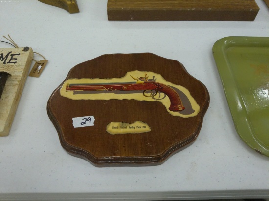 vintage wood gun wall plaque, shows a image of a french flintlock duelling pistol 1810 made by charl