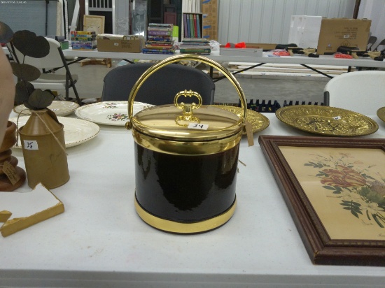 vintage ice bucket, black and gold color with metal top and handle 7in tall and 7in across