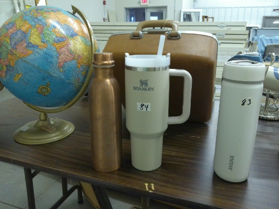 designer sports water bottles, by stanley and copper bottle by berigora both are 10in tall