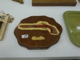 vintage wood gun wall plaque, shows a image of a french flintlock duelling pistol 1810 made by charl