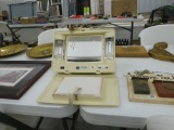 vintage travel makeup mirror and stroage cabinet, made by rayette has a stand and storage box does w