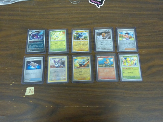 pokemon cards, 10 english holographic cards in mint shape all in hard top loaders