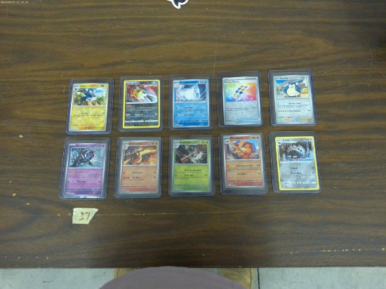 pokemon cards, 10 english holographic cards in mint shape all in hard top loaders