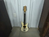 youth electric guitar, by first act 30in long wood body and neck needs strings