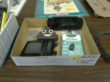 electronic lot, nextar gps, psp, usb adapters, poop emoji power block and mag glass