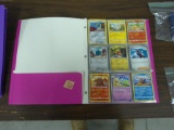 pokemon cards, notebook full of the popular cards in great shape
