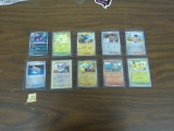 pokemon cards, 10 english holographic cards in mint shape all in hard top loaders