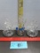 Three clear glass cruets