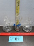 Three clear glass cruets