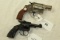 2 Firearms: Rohm RG10 .22 Short and Rossi .38 Revolvers