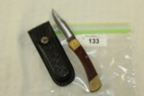 Buck 110 Lockblade Knife with Black Leather Pouch. U.S.A.