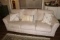 Beige Color Sofa with Throw Pillows
