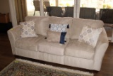 Beige Color Sofa with Throw Pillows